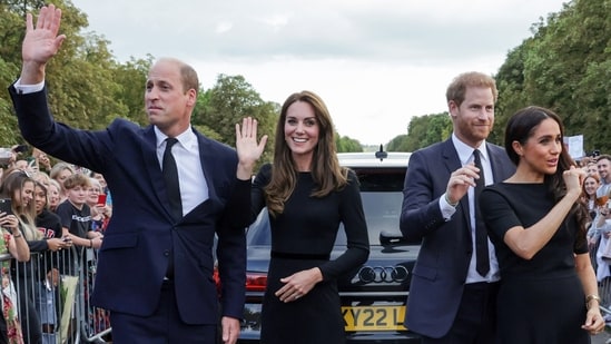 Prince Harry and Meghan Markle, the Duke and Duchess of Sussex, made a surprise appearance outside Windsor Castle with Prince William and Kate Middleton, the new Prince and Princess of Wales, to view the public tributes to the late Queen Elizabeth II. The brothers, with their wives, waved at the well-wishers on the Long Walk at Windsor Castle on September 11, 2022 (IST).&nbsp;(AFP)