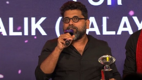Mahesh Narayanan&nbsp;with the award for Best Story (Film) for Malik.