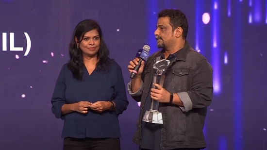 Pushkar and Gayathri receive the award for Best Screenplay (Series) for Suzhal.