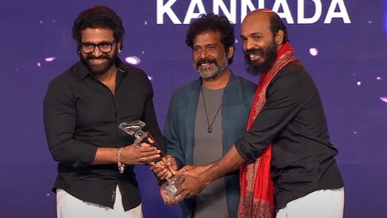 Raj B Shetty and Rishab Shetty receive the award for Pioneering Contributions to New Wave Cinema.