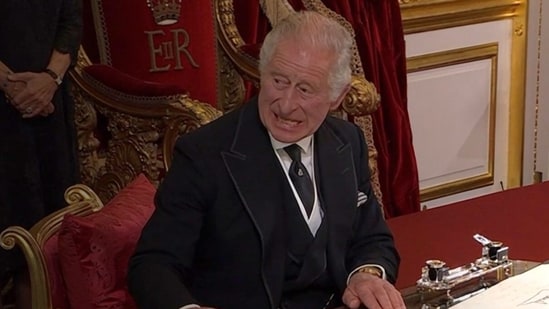 Britain's King Charles III gets angry at his aide for not clearing the desk. The moment, captured on camera, has been doing rounds on social media platforms.(Screengrab)