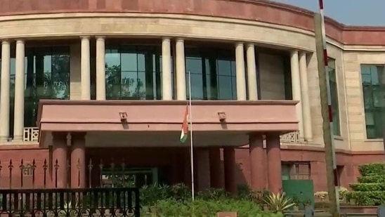 National flag fly at half-mast as one-day state mourning is being observed in the country.(ANI)
