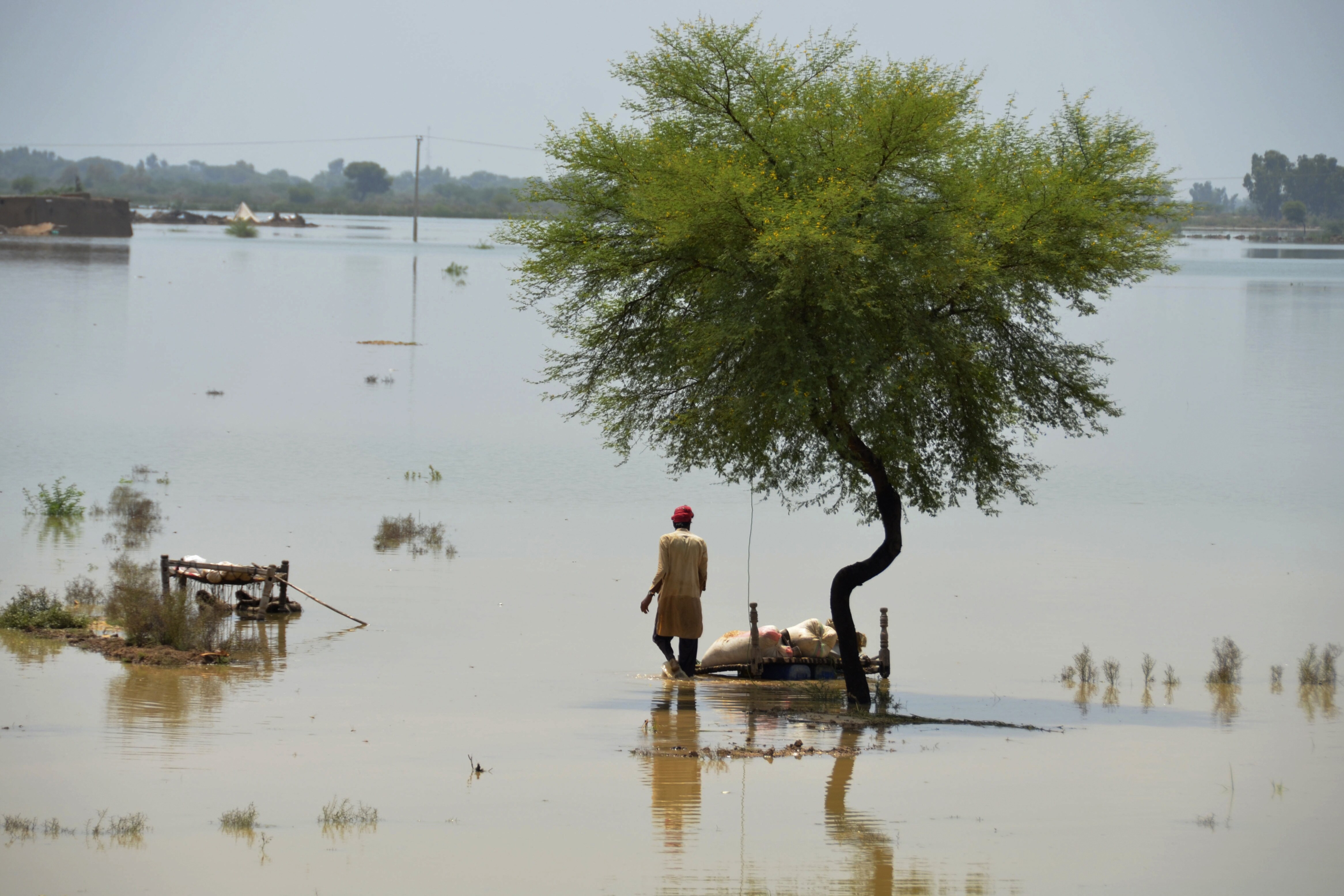 Pakistan floods that devastated large parts of the country in August, leaving hundreds of thousands of people homeless and killing around 1,500 people was made highly likely due to climate crisis, WWA concluded in a statement on September 15. (AP) Pakistan floods that devastated large parts of the country in August, leaving hundreds of thousands of people homeless and killing around 1,500 people was made highly likely due to climate crisis, WWA concluded in a statement on September 15. (AP)