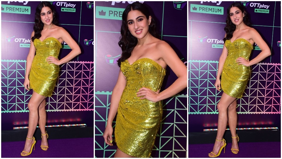 Sara Ali Khan at the OTTplay Awards 2022 in a yellow sequinned ensemble.&nbsp;(HT Photo/Varinder Chawla)