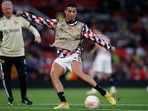 Cristiano Ronaldo warms up ahead of a match for Manchester United.