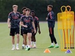 Arsenal's Kieran Tierney, Rob Holding and Ben White during training&nbsp;