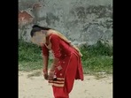 Screengrab from viral video: A woman in Maqboolpura locality in Amritsar, purportedly under the influence of drugs. (Twitter) Screengrab from viral video: A woman in Maqboolpura locality in Amritsar, purportedly under the influence of drugs. (Twitter)