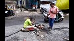 A civic staff cleans a choked drainage at Dolphin chowk, Upper Indiranagar on Monday. (Rahul Raut/HT PHOTO) A civic staff cleans a choked drainage at Dolphin chowk, Upper Indiranagar on Monday. (Rahul Raut/HT PHOTO)