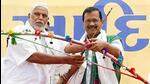 AAP chief Arvind Kejriwal with Bharatiya Tribal Party (BTP) founder Chhotubhai Vasava at the ‘Adivasi Sankalp Mahasammelan’ in Chanderiya, in Gujarat’s Bharuch on May 1 (Twitter/(AAP Gujarat. Mission2022) AAP chief Arvind Kejriwal with Bharatiya Tribal Party (BTP) founder Chhotubhai Vasava at the ‘Adivasi Sankalp Mahasammelan’ in Chanderiya, in Gujarat’s Bharuch on May 1 (Twitter/(AAP Gujarat. Mission2022)