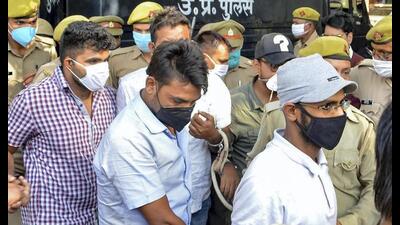 In this Oct 7, 2020 file photo, police produce journalist Siddique Kappan (right) and three others before a court in Mathura. The SC granted bail to journalist Kappan, arrested in October 2020 while on his way to Hathras in UP where a Dalit woman had died after allegedly being gang-raped. (PTI Photo)