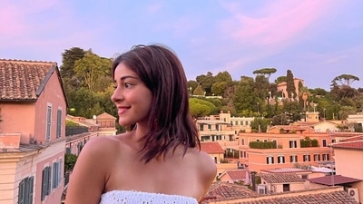 Ananya Panday kept it simple yet stylish in a pretty strapless white dress. She paired her look with pink boho-inspired jewellery. (Instagram/@ananyapanday) Ananya Panday kept it simple yet stylish in a pretty strapless white dress. She paired her look with pink boho-inspired jewellery. (Instagram/@ananyapanday)