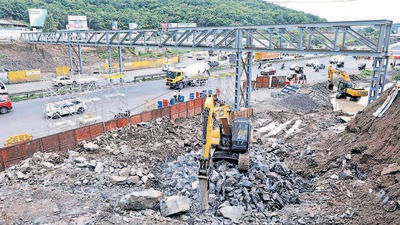 NHAI, Pune district administration and other authorities have speeded up work related to the demolition of the old bridge at Chandni chowk, including shifting of service pipelines, installation of gelatin sticks and finalisation of traffic diversions. (RAHUL RAUT/HT) NHAI, Pune district administration and other authorities have speeded up work related to the demolition of the old bridge at Chandni chowk, including shifting of service pipelines, installation of gelatin sticks and finalisation of traffic diversions. (RAHUL RAUT/HT)