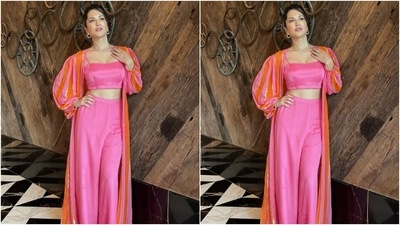 Styled by fashion stylist Hitendra Kapopara, Sunny wore her tresses into a bun with a section of hair left open around her face. (Instagram/@sunnyleone)
