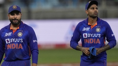 India's captain Rohit Sharma, left, reacts as he leaves the field with teammate Suryakumar Yadav (AP) India's captain Rohit Sharma, left, reacts as he leaves the field with teammate Suryakumar Yadav (AP)