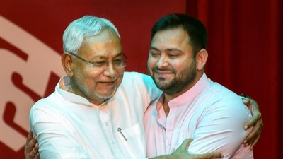 Bihar Chief MInister Nitish Kumar with his deputy Tejaswi Yadav after their swearing-in ceremony at Rajbhawan in Patna on August 10. (PTI)