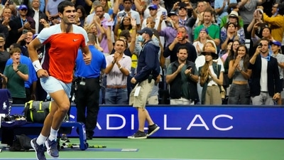 Carlos Alcaraz (ESP) runs towards his players box after his match against Casper Ruud (NOR) (not pictured) in the men's singles final on day fourteen of the 2022 U.S. Open (USA TODAY Sports)