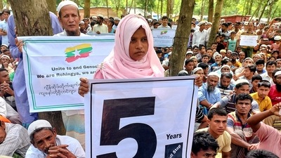 FILE PHOTO: Rohingya refugees hold placards as they gather at the Kutupalong Refugee Camp to mark the fifth anniversary of their fleeing from neighbouring Myanmar to escape a military crackdown in 2017, in Cox's Bazar, Bangladesh,&nbsp; (REUTERS)