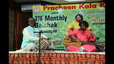 Mohan Veena exponent Ajay P Jha was accompanied by city-based Dr Mahendra Prasad Sharma on Tabla at the ML Koser Auditorium, Pracheen Kala Kendra, Chandigarh. (HT Photo)