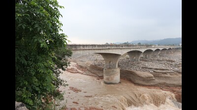 Chakki Highway bridge that was closed on August 25 due to scouring of its foundation has been reopened for light traffic, bringing relief to the hundreds of daily commuters. (HT Photo) Chakki Highway bridge that was closed on August 25 due to scouring of its foundation has been reopened for light traffic, bringing relief to the hundreds of daily commuters. (HT Photo)
