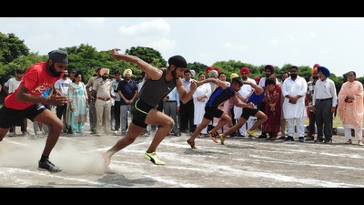 Athletes in action during a track event at the district-level games being organised under ‘Khedan Watan Punjab Deyan 2022’ in Mohali on Monday. (HT Photo)