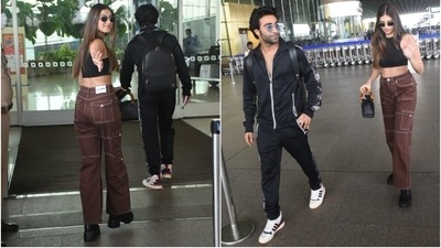 Tara Sutaria and her boyfriend, Aadar Jain, arrived at the Mumbai airport today. The couple were clicked by the paparazzi dressed in comfy ensembles, acing the casual airport fashion game. While Tara chose a crop top and trendy pants set for catching her flight, Aadar complemented the Ek Villain Returns actor in an all-black tracksuit. Keep scrolling to check out their airport pictures. (HT Photo/Varinder Chawla) Tara Sutaria and her boyfriend, Aadar Jain, arrived at the Mumbai airport today. The couple were clicked by the paparazzi dressed in comfy ensembles, acing the casual airport fashion game. While Tara chose a crop top and trendy pants set for catching her flight, Aadar complemented the Ek Villain Returns actor in an all-black tracksuit. Keep scrolling to check out their airport pictures. (HT Photo/Varinder Chawla)