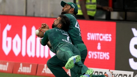 Shadab Khan and Asif Ali collide while attempting a catch during Asia Cup final(REUTERS)