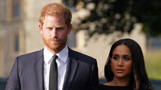 Britain's Prince Harry and Meghan, Duchess of Sussex on the long Walk at Windsor Castle before meeting well-wishers.&nbsp;(AFP)