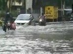 Screengrab of the video showing waterlogging in Kolkata. (ANI/ Twitter) Screengrab of the video showing waterlogging in Kolkata. (ANI/ Twitter)