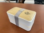 This is the lunchbox that has apparently been offered as a perk for the staff. ((Twitter/ @remytumin) ) This is the lunchbox that has apparently been offered as a perk for the staff. ((Twitter/ @remytumin) )