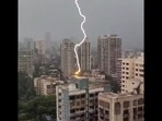 The image, taken from the viral Instagram video, shows a bolt of lightning striking a high-rise building in Mumbai's Borivali West.(Instagram/@vibhutibandekar) The image, taken from the viral Instagram video, shows a bolt of lightning striking a high-rise building in Mumbai's Borivali West.(Instagram/@vibhutibandekar)