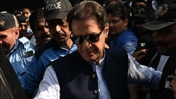 Former Pakistani Prime Minister Imran Khan leaves after appearing in the Islamabad High Court.