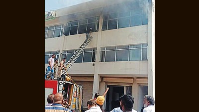 Fire fighting operations underway at the shop in Baltana area of Zirakpur in Mohali on Tuesday. (HT Photo)