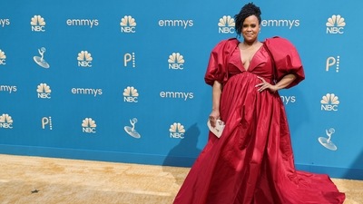 Natasha Rothwell of The White Lotus chose red for a gown with balloon short sleeves. It was custom silk taffeta from Safiyaa. (REUTERS)