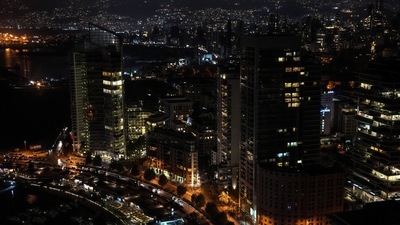 Beirut and suburbs are lit by privately-owned diesel generators that provide power to homes and businesses during a blackout. (AP)