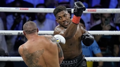 Anthony Joshua launches a blow at Oleksandr Usyk during their world heavyweight title fight (AP) Anthony Joshua launches a blow at Oleksandr Usyk during their world heavyweight title fight (AP)