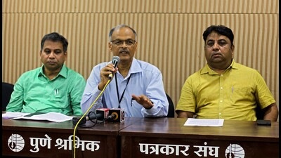 Maharashtra Chief Election Officer (CEO) Shrikant Deshpande (centre) at a press conference in Pune on Tuesday. (Ravindra Joshi/HT PHOTO)
