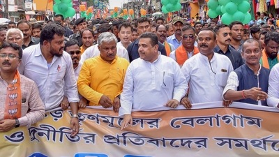Suvendu Adhikari with BJP leaders participates in a protest march against the state government, in Alipurduar district, Friday, Sept. 9, 2022. (PTI) Suvendu Adhikari with BJP leaders participates in a protest march against the state government, in Alipurduar district, Friday, Sept. 9, 2022. (PTI)