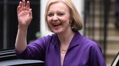 UK Unemployment rate drops: UK PM Liz Truss smiles and waves.