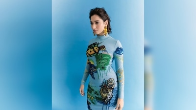 The dress also features colourful embroidered graphics both at the front and back that are created with thousands of minute hand-embroidered stitches with multi-colored sequins made in over 200 man-hours. (Instagram/@tamanaahspeaks) The dress also features colourful embroidered graphics both at the front and back that are created with thousands of minute hand-embroidered stitches with multi-colored sequins made in over 200 man-hours. (Instagram/@tamanaahspeaks)