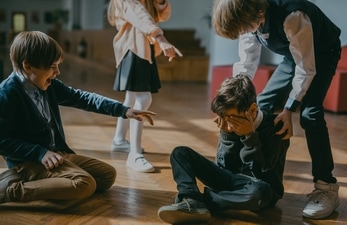 Parenting tips to help your child recognize and deal with bullying at school (Mikhail Nilov) Parenting tips to help your child recognize and deal with bullying at school (Mikhail Nilov)