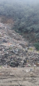 Waste dump near Mandi which is also polluting water bodies. Waste dump near Mandi which is also polluting water bodies.
