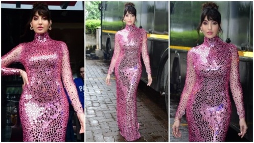 Nora Fatehi pairs gold accessories with the maximalist look. (HT Photo/Varinder Chawla) Nora Fatehi pairs gold accessories with the maximalist look. (HT Photo/Varinder Chawla)