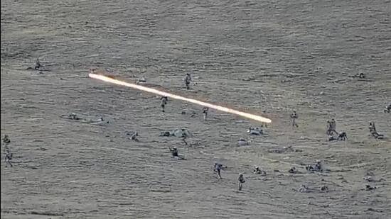 Image taken from YouTube footage released by Armenia on Tuesday shows Azerbaijanian servicemen crossing the border and approaching the Armenian positions. Armenia's PM said 49 soldiers were killed in nighttime attacks by Azerbaijan. (AP)