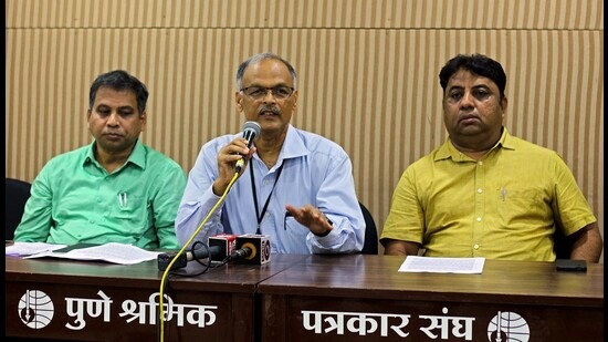 Maharashtra Chief Election Officer (CEO) Shrikant Deshpande (centre) at a press conference in Pune on Tuesday. (Ravindra Joshi/HT PHOTO)