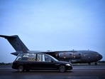 The coffin of Queen Elizabeth II is taken away in the Royal Hearse from the Royal Air Force Northolt airbase to travel to Buckingham Palace.(AFP) The coffin of Queen Elizabeth II is taken away in the Royal Hearse from the Royal Air Force Northolt airbase to travel to Buckingham Palace.(AFP)