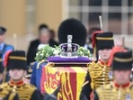 The coffin of Queen Elizabeth II, adorned with a Royal Standard and the Imperial State Crown and pulled by a Gun Carriage of The King's Troop Royal Horse Artillery, is pictured during a procession from Buckingham Palace to the Palace of Westminster, in London.(AFP) The coffin of Queen Elizabeth II, adorned with a Royal Standard and the Imperial State Crown and pulled by a Gun Carriage of The King's Troop Royal Horse Artillery, is pictured during a procession from Buckingham Palace to the Palace of Westminster, in London.(AFP)