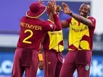 Andre Russell (R)(AP) Andre Russell (R)(AP)