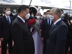 Chinese President Xi Jinping is welcomed by Kazakh President Kassym-Jomart Tokayev upon his arrival in Nur-Sultan, Kazakhstan September 14.&nbsp;