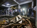 Ahmedabad: Debris lie on the ground after the elevator of an under-construction building crashed, in Ahmedabad, Wednesday.