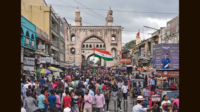 Visitors crowd the street near the landmark Charminar monument on Independence Day in Hyderabad, 2022 (AP)